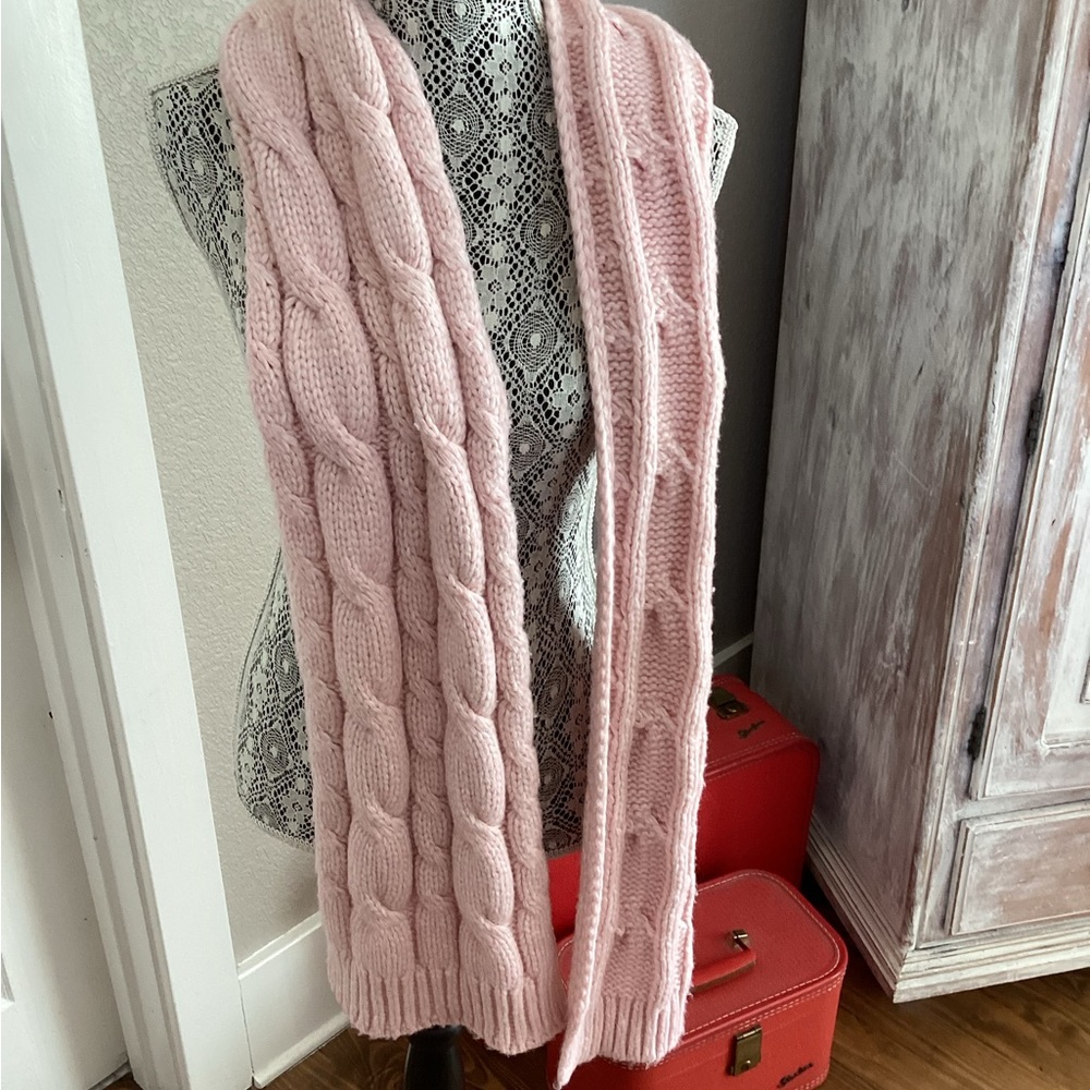 Pink cable knit scarf